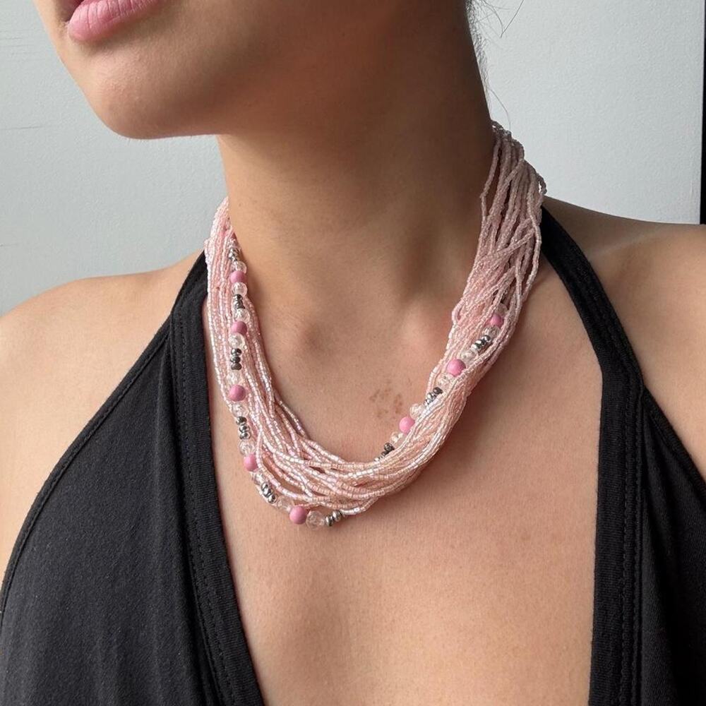 Pink multi strand beaded necklace with silver accents and pink beads
